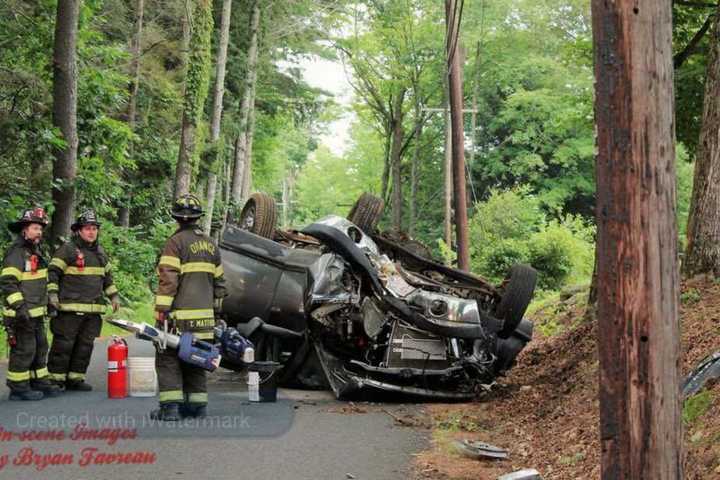 Rollover Crash In Massachusetts Crash Traps Two Inside