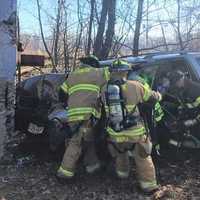 <p>Firefighters at work extricating the victim in Teaneck.</p>