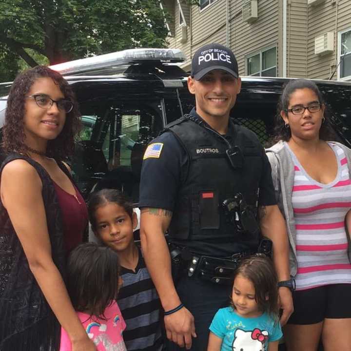 Beacon Police Officer Peter Boutros, seen here visiting a summer program in South Davies Terrace.