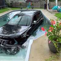 <p>A Jeep landed in a backyard pool after crashing and plowing through two backyards Monday in Gloucester Township.</p>