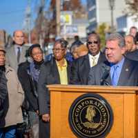 <p>Yonkers Mayor Mike Spano announcing the naming of Winston K. David Place.</p>