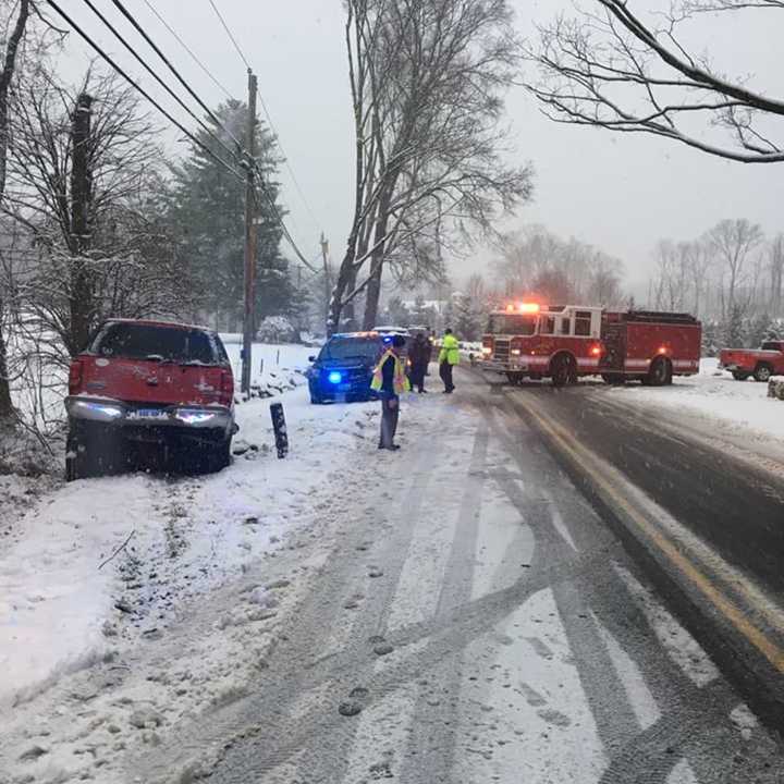 A vehicle went off the roadway on Old Redding Road in Weston near the country club on Saturday afternoon and came to rest in a small waterway.