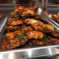 <p>There are several different types of chicken offered at the hot and cold food bars.</p>