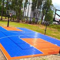 <p>An orange and blue basketball court will honor Joe Neumiller at St. Gregory The Great School.</p>