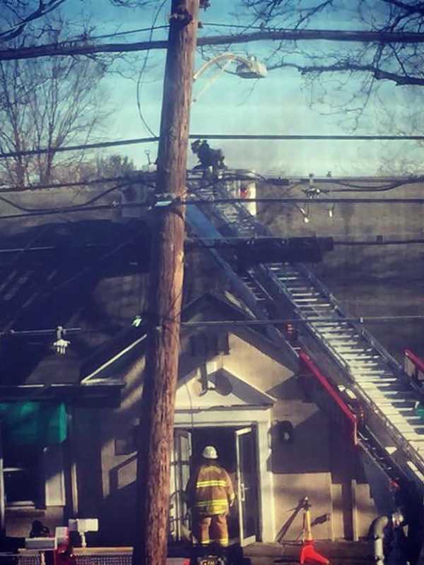 Fire At Stratford Laundromat Extends To Roof Of Building