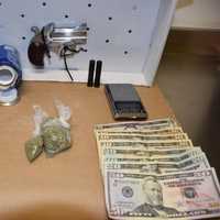 <p>Items found in the car and seized included a loaded handgun, 46 Methylone pills, plastic bags containing 12 grams of marijuana, cash believed to be the proceeds of narcotics sales, five glassine baggies of crack cocaine and a scale, police said.</p>