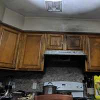 <p>A stove fire that moved to the cabinets, displaced two families.</p>