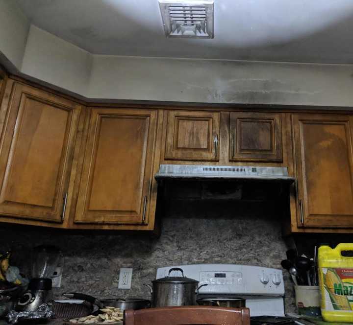 A stove fire that moved to the cabinets, displaced two families.