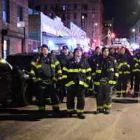 <p>Members of the FDNY attend a vigil for the victims.</p>