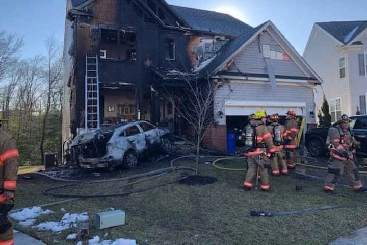 SUV Explodes After Crashing Into Middle River Home, 2 Hurt