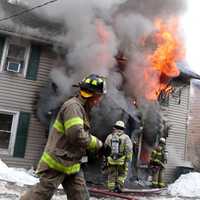 <p>Brewster firefighters at work.</p>