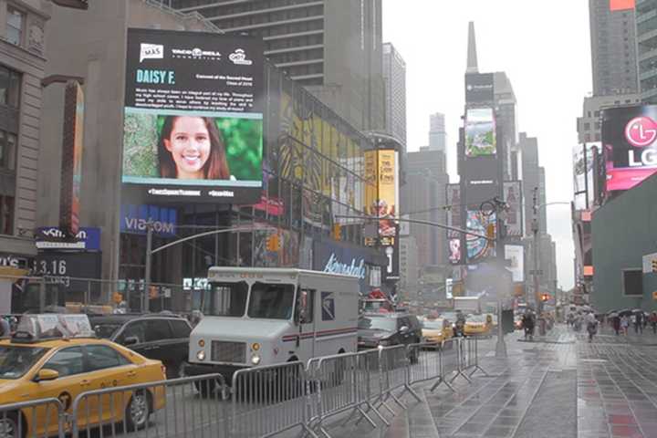 New Rochelle resident Daisy Flores&#x27; picture in Times Square.