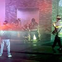 <p>Garfield&#x27;s bravest cut through a garage door to access the fire at Metro Industrial Supply Company at the corner of Morell Place and Charles Street.</p>