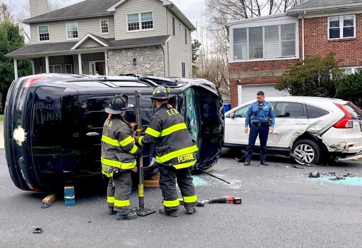 Englewood firefighters at the scene of the crash on Van Nostrand Avenue off Route 4.