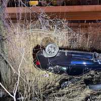 <p>The BMW landed on its roof in a ravine off the Garden State Parkway in Saddle Brook.</p>