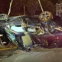 <p>Wreckage of the BMW SUV crash on the Garden State Parkway in Saddle Brook.</p>