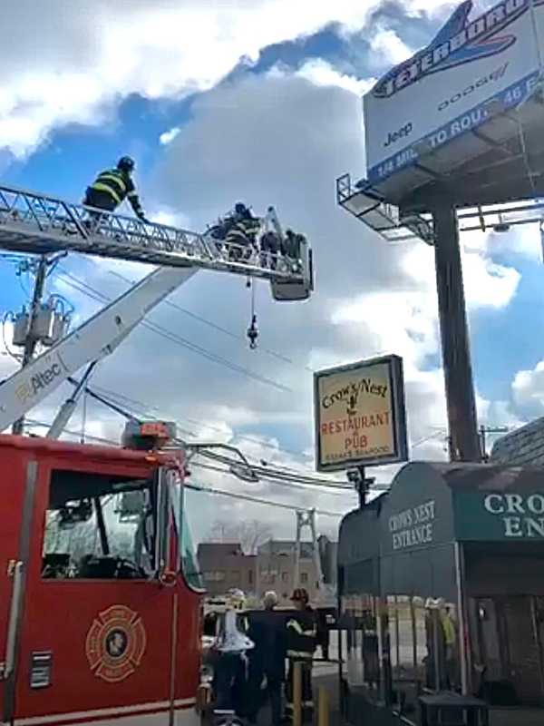 40 FEET UP: Hackensack Firefighters Rescue Workers Stuck In Boom Truck