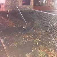 <p>The driver of a Porche Cayenne attempted to flee police before driving through a fence at the Airmont Diner and flattening his tires.</p>