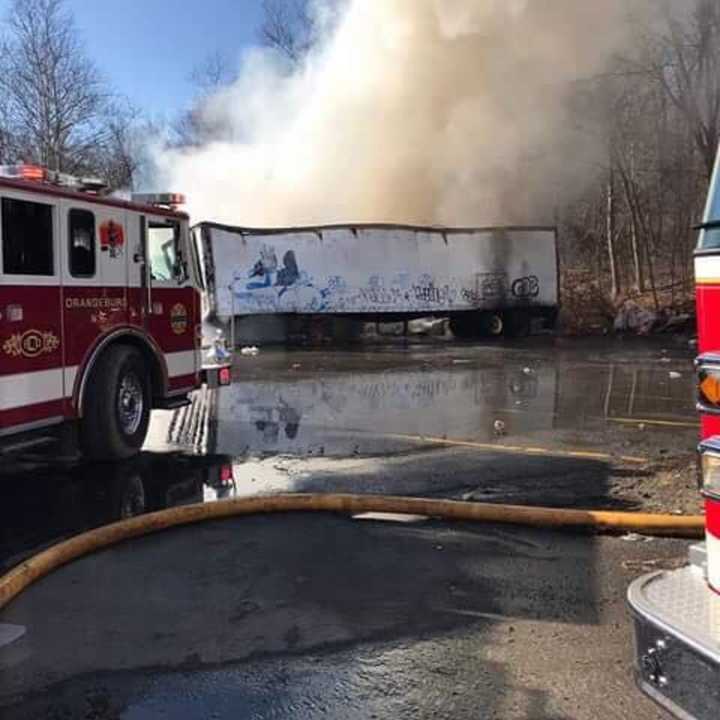 Several tractor-trailers were on fire at a local plastics company.