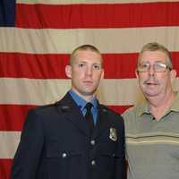 <p>Police Officer Greg Tobin with his son Greg, also a Clarkstown Police officer.</p>