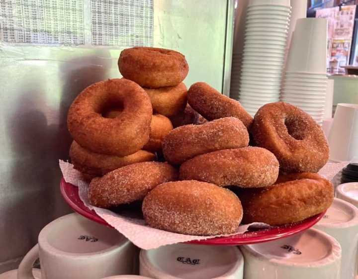 Yum, the cinnamon, and sugar donuts hot out of the fryer.