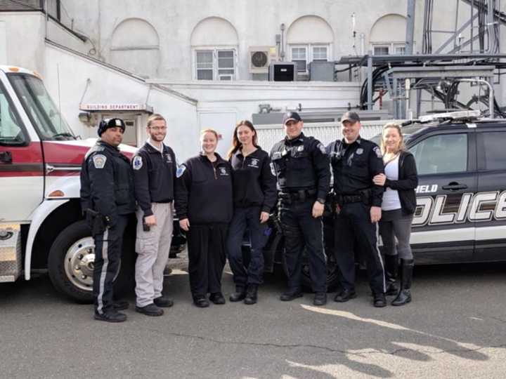 L to R: Officer Jose Portorreal, Lt. Max Farkas, Lt. Melissa Naylis, EMT Katie Rolik, Officer Rick Tauber, Officer Tim Knapp, EMT Jennie Mazzilli. Not pictured: Paramedic Chris Kerrigan and Paramedic Ellen Davis.