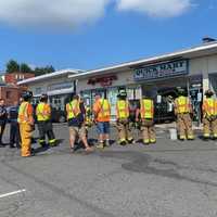 <p>Fair Lawn police and firefighters responded to the crash at the Quick Mart on Broadway.</p>