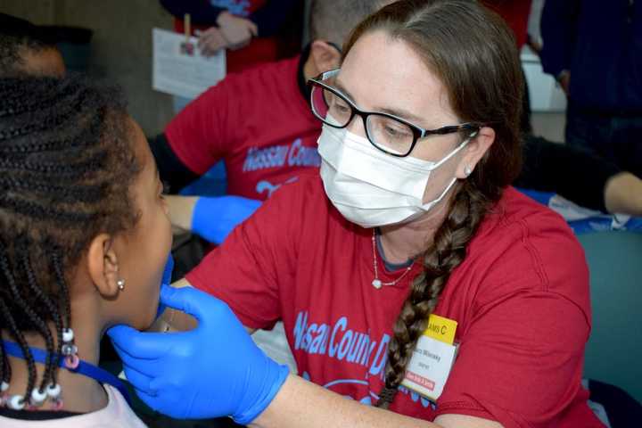 More than 350 volunteers and 100 dentists provided free dental screenings, fluoride treatments and oral hygiene instruction to 1,500 underserved and special needs children as part of Nassau County Dental Society’s 17th annual “Give Kids a Smile Day.”