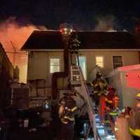 <p>A house was heavily damaged by an early morning fire in Norwalk.</p>