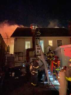 Fire Breaks Out At Home Attached To Strip Mall In CT