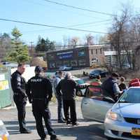 Photos: Car Crashes Into Building, Guard Rail In Area