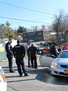 Photos: Car Crashes Into Building, Guard Rail In Area