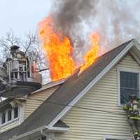 <p>Flames shot out of the roof in the Glen Rock fire.</p>