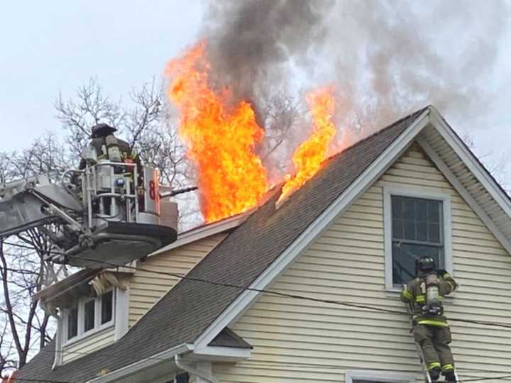 Flames shot out of the roof in the Glen Rock fire.