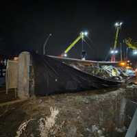 <p>The trailer that tipped with its rig on the westbound Route 46 off-ramp in Ridgefield Park was loaded with construction debris.</p>