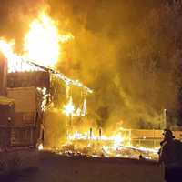 <p>Chilling photo of the rear of the house destroyed by fire on Blueridge Road in Lodi.</p>