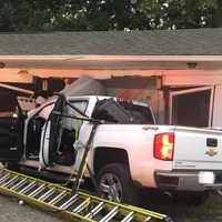 <p>The truck barrelled through a telephone pole and into the Surrey Inn in Huntingtown.</p>