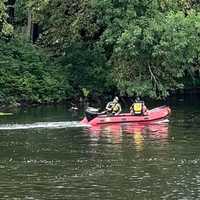 <p>Recovery team on the Passaic River.</p>