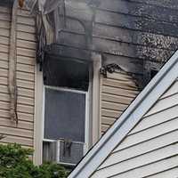 <p>The fire apparently began in a second-floor bedroom and extended to the third floor of the Harrison Street home in Passaic on Wednesday, Oct. 5.</p>