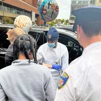 <p>Members of the Baltimore Police Department were on hand to welcome the officer back.</p>