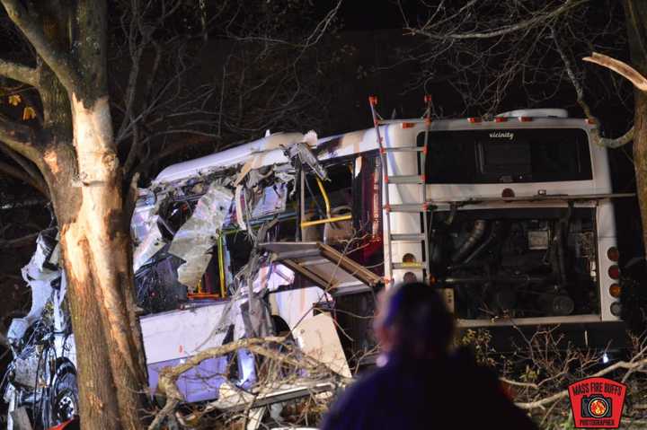 A shuttle bus carrying 27 Brandeis University students crashes on South Street in Waltham on Saturday, Nov. 19, 2022.