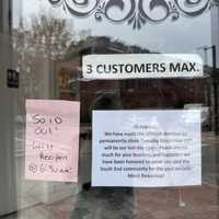 <p>A sign on the front window of Cafe Madeline in Boston announces their last day of business will be Tuesday, Nov. 15</p>