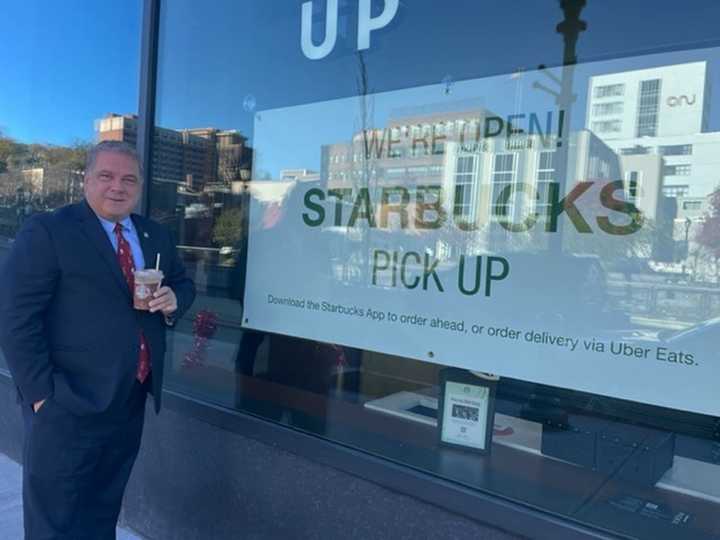 Yonkers Mayor Mike Spano orders from the new &quot;pick-up only&quot; Starbucks location in the city at 16 Nepperhan St.