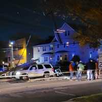 <p>The crash on Central Boulevard in Palisades Park knocked the bottom of the utility pole onto the SUV and left the top dangling overhead.</p>