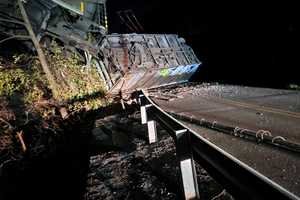 PHOTOS: Train Dangles Off Bridge Following Derailment In Central Pennsylvania