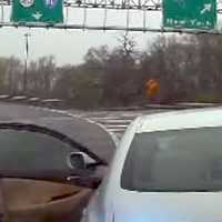 <p>Dashcam video from a police vehicle directly behind his sedan shows Bradley G. Pullman swinging the driver&#x27;s side door open and pointing the gun before he&#x27;s shot.</p>