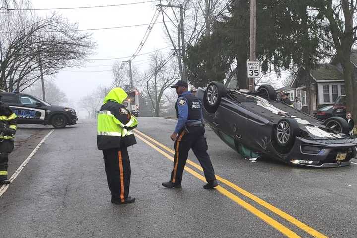 Driver Climbs Out After Rollover Crash In Wayne