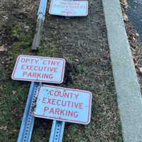 <p>The signs marking VIP parking spots for county officials that were removed.</p>