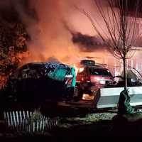 <p>Longmeadow firefighters battle a blaze on Dunn Road over the weekend.</p>