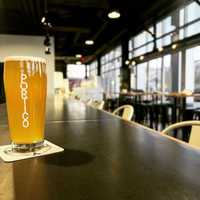 <p>Beer is the main event at Portico, but guests can also enjoy pizzas, salads, and subs from the brewery&#x27;s kitchen.</p>